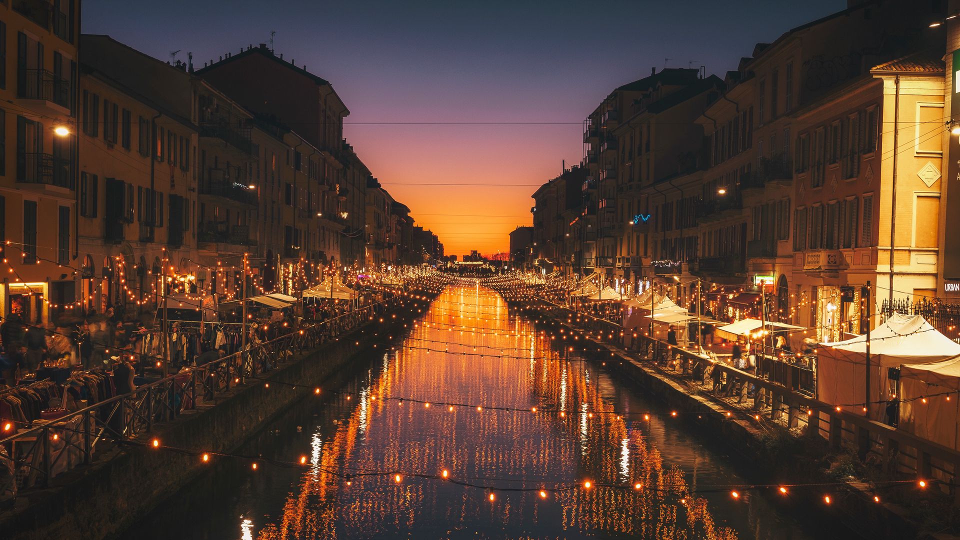 Beautiful Milan canal at sunset with romantic golden lighting